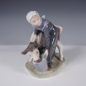 Royal Copenhagen Porcelain Figurine, Girl Feeding Calf