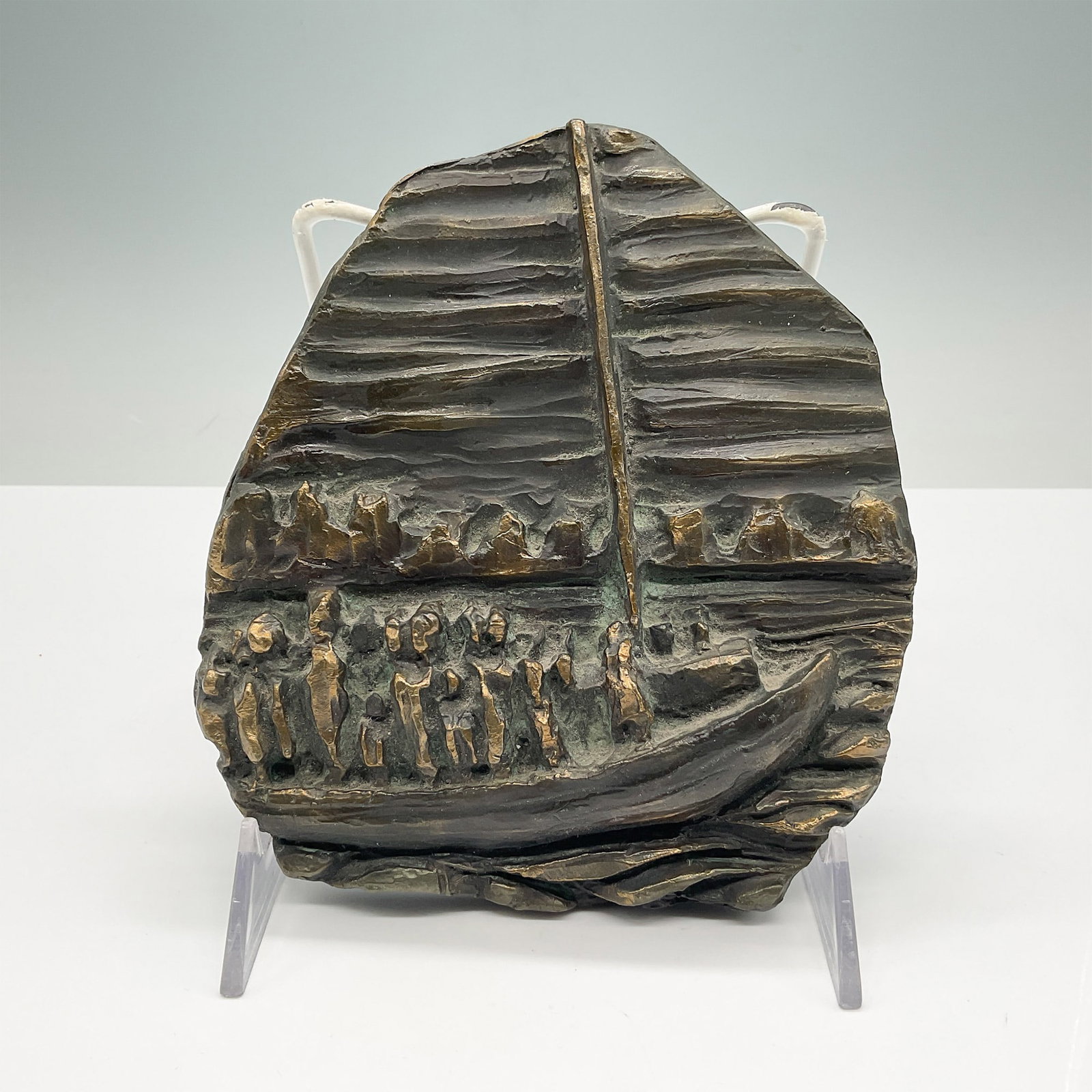 Kenneth Treister Bronze Relief Sculpture, Exodus: A limited-edition bronze relief sculpture titled Exodus by renowned American sculptor and architect Kenneth Treister. Dated June 1969. The relief depicts a symbolic scene of migration, featuring a gro