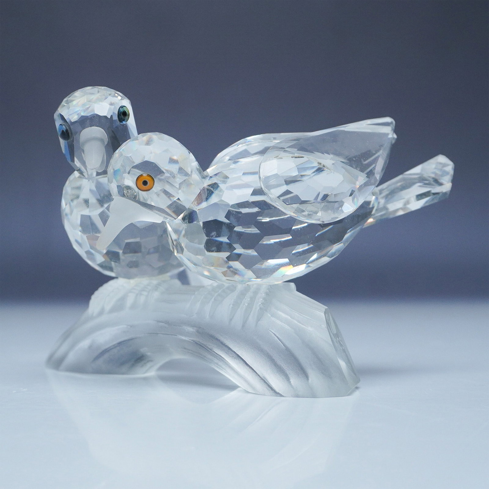 Swarovski 1989 Annual Edition Crystal Figurine, Amour: This exquisite Swarovski crystal figurine was released in 1989 as the final piece in the Swarovski Collectors Society (SCS) Caring and Sharing" trilogy. The piece features two intricately crafted turt