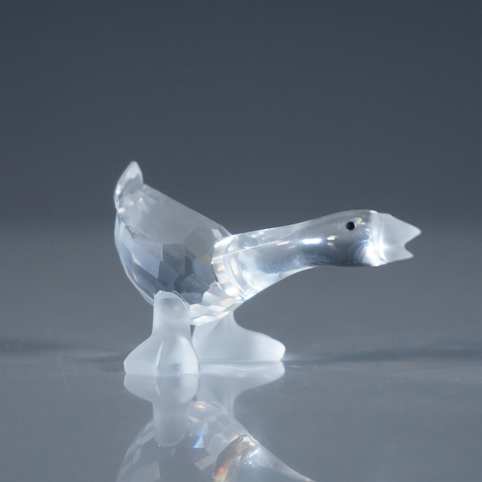 Swarovski Silver Crystal Figurine, Harry Gosling: This retired Swarovski crystal Harry Gosling was part of the Barnyard Friends theme group and his body is made from clear faceted crystal, with black eyes, and the beak and feet are in frosted crystal