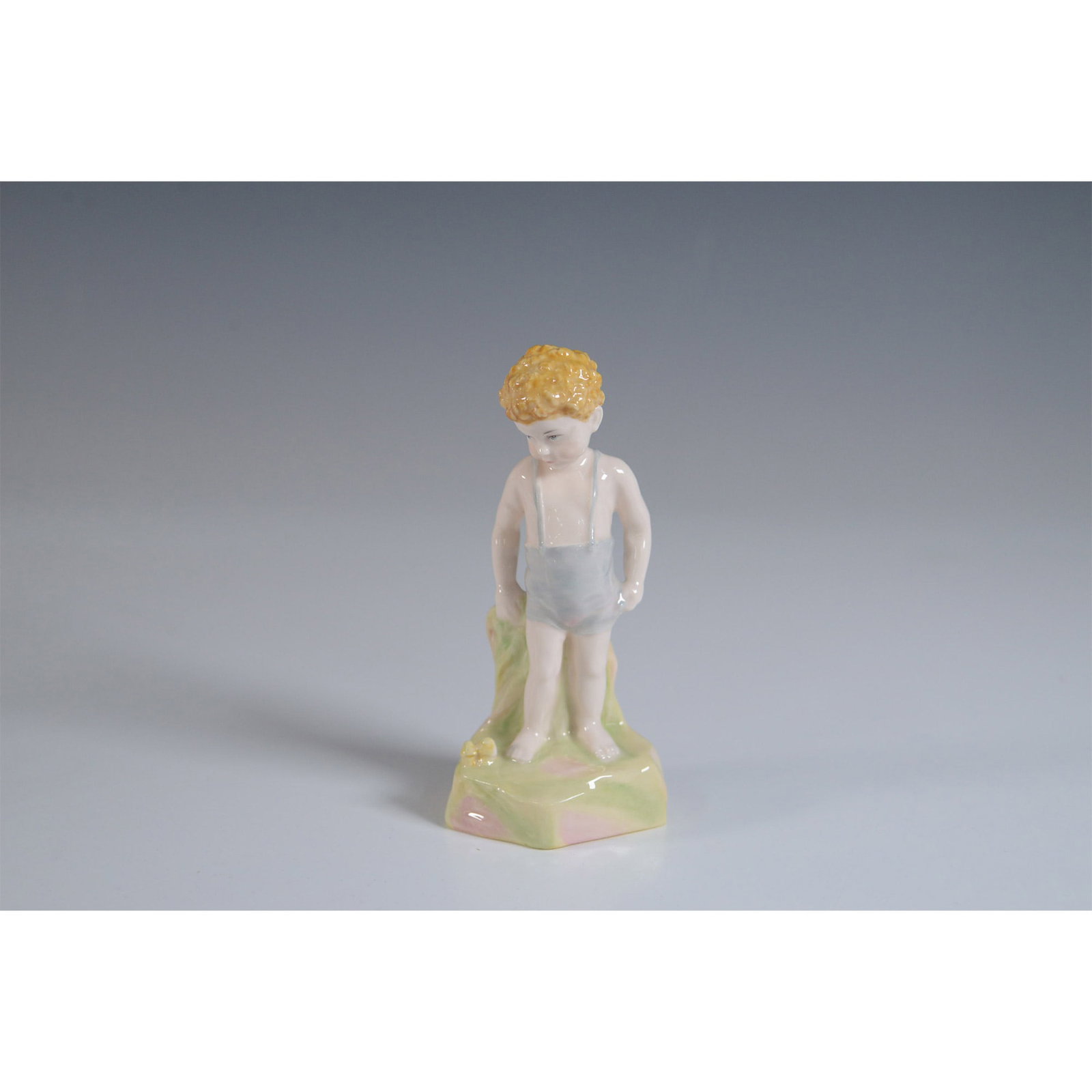 Royal Doulton Do You Wonder Where Fairies Figurine HN4429: A charming Royal Doulton bone china figurine titled Do You Wonder Where Fairies Are, part of the Archives Collection and modeled by Ann H. L. Young. This limited-edition figurine, numbered 224, featur