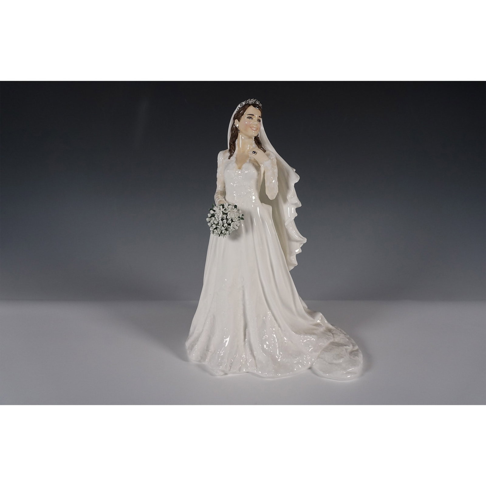 Kate Middleton, Limited Edition - Royal Doulton Figurine: Royal Doulton fine bone china figurine titled Kate Middleton, designed by John Bromley to commemorate the marriage of Their Royal Highnesses, The Duke and Duchess of Cambridge, on April 29, 2011. This