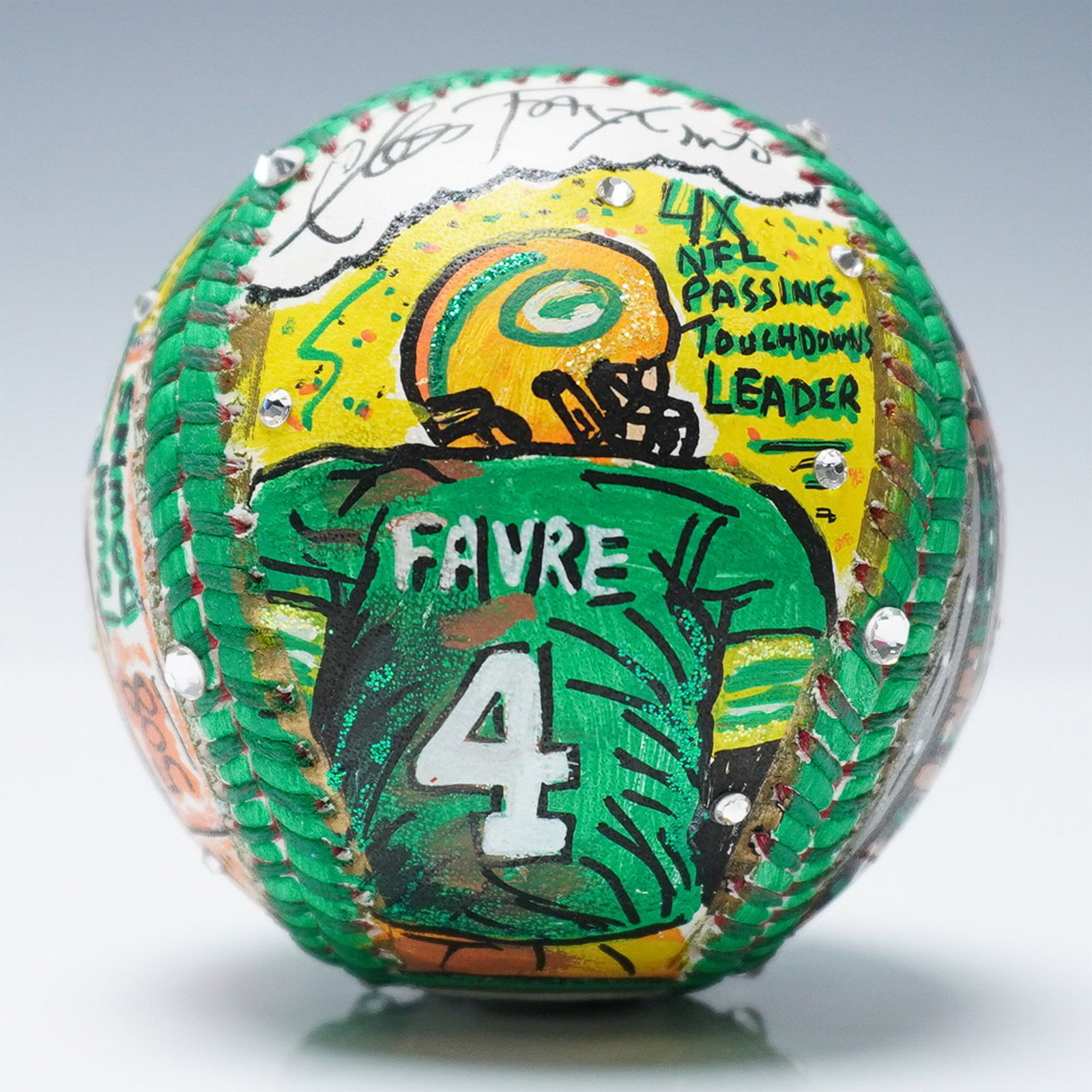 Brett Favre Signed Charles Fazzino Hand Painted Pop Art Baseball: Brett Favre themed hand-painted baseball designed by Charles Fazzino, a recognized pop artist known for his three-dimensional artwork and sports-related pieces. This unique mixed-media artwork incorpo