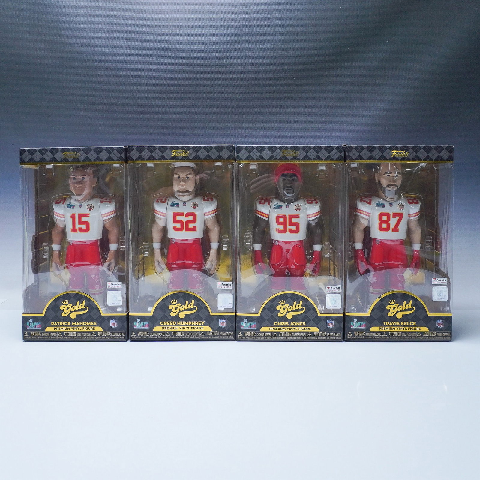 Set of 4 Funko Gold Kansas City Chiefs Super Bowl LVII Figurines: Funko Gold limited edition Kansas City Chiefs Super Bowl LVII figurine set. The set includes four collectible vinyl figures: Patrick Mahomes (#15), Creed Humphrey (#52), Chris Jones (#95), and Travis 