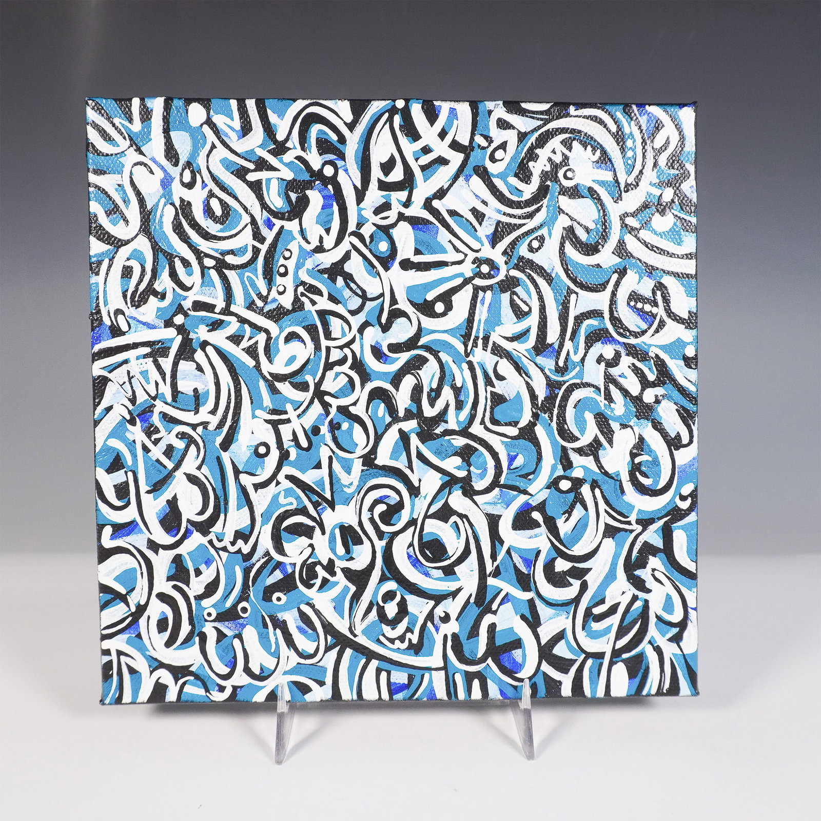 Abe Onkst Acrylic Painting, Abstract Calligraphic Composition: Acrylic on canvas painting by Abe Ankst, signed and dated 2024. Features layered black, white, and blue calligraphic forms in an abstract, graffiti-inspired style. The energetic composition creates a 