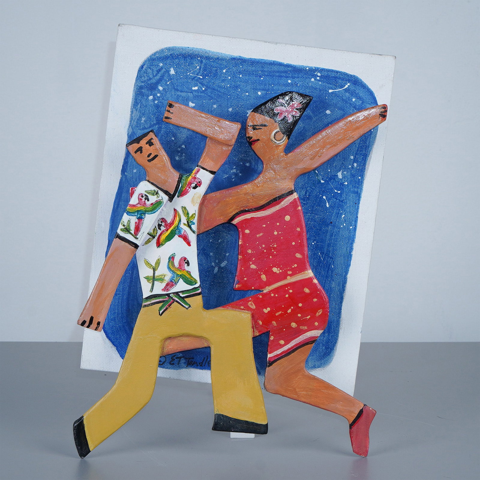 E.T. Tendler Mixed Media Artwork, Rhythms of the Tropics: A striking mixed-media artwork by E.T. Tendler, titled Rhythms of the Tropics. This lively piece showcases a dancing couple in a tropical scene, with a hand-painted parrot-adorned shirt and festive at