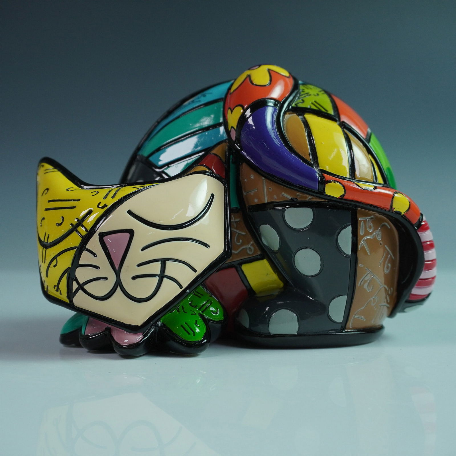 Romero Britto "Tim" Sculpture, 2nd Edition: Tim is a captivating sculpture from the colorful world of Romero Britto, showcasing a playful and artistic interpretation of a cat. This sculpture is part of Britto's distinctively vibrant and pattern