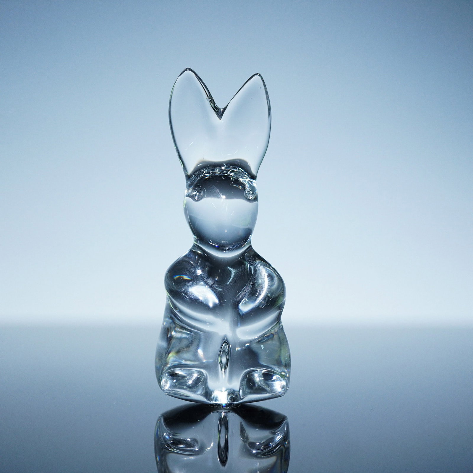 Baccarat Crystal Spinning Rabbit Figurine Clear: This delightful Baccarat crystal spinning rabbit figurine showcases a charming, rounded design that allows it to wobble and spin gently when touched. Crafted from clear Baccarat crystal, this playful 