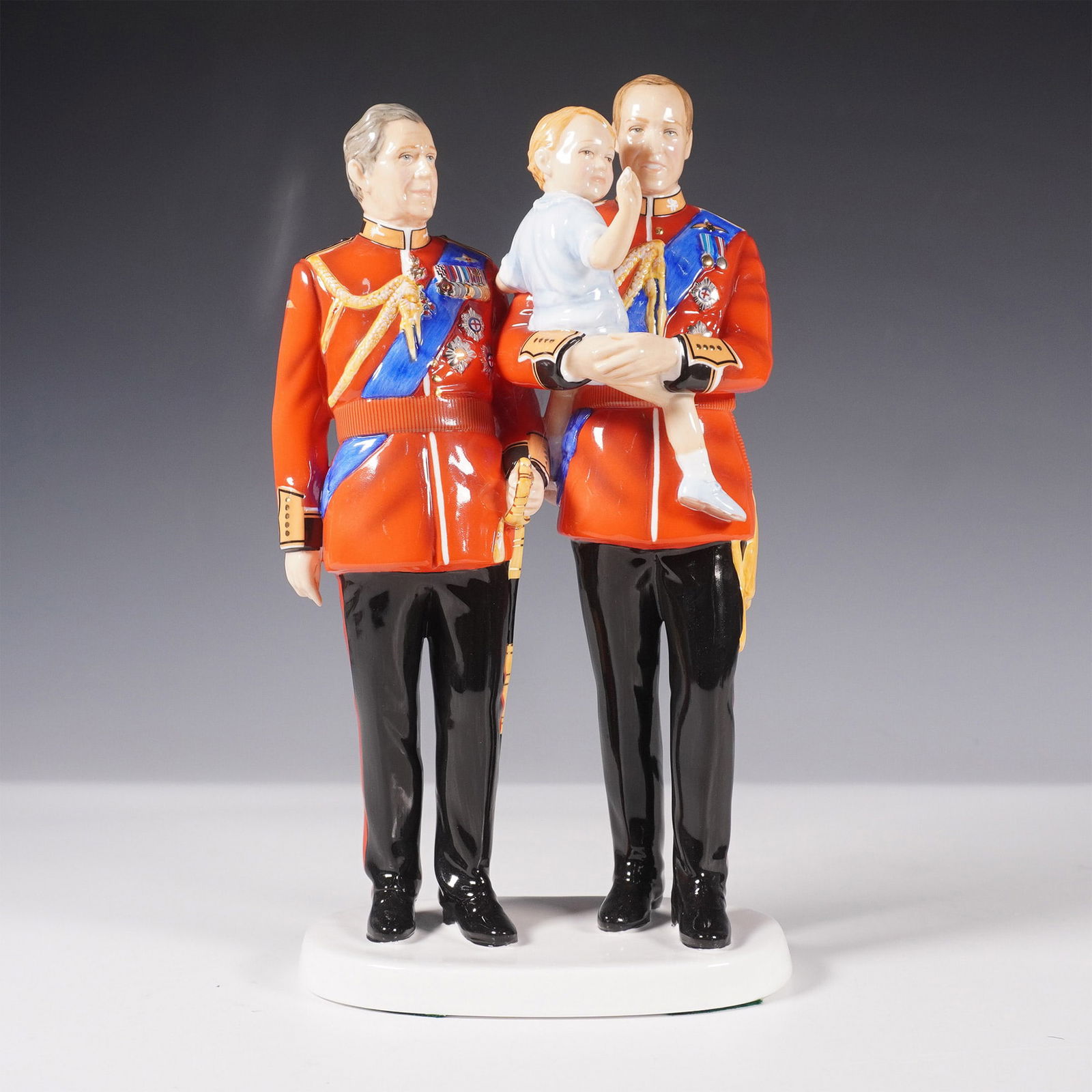 Royal Doulton Future Kings Figurine HN 5884: The Royal Doulton Future Kings figurine (HN 5884) is a striking limited edition bone china piece modeled by Neil Welch. This hand-decorated figurine features King Charles III, Prince William, and a yo