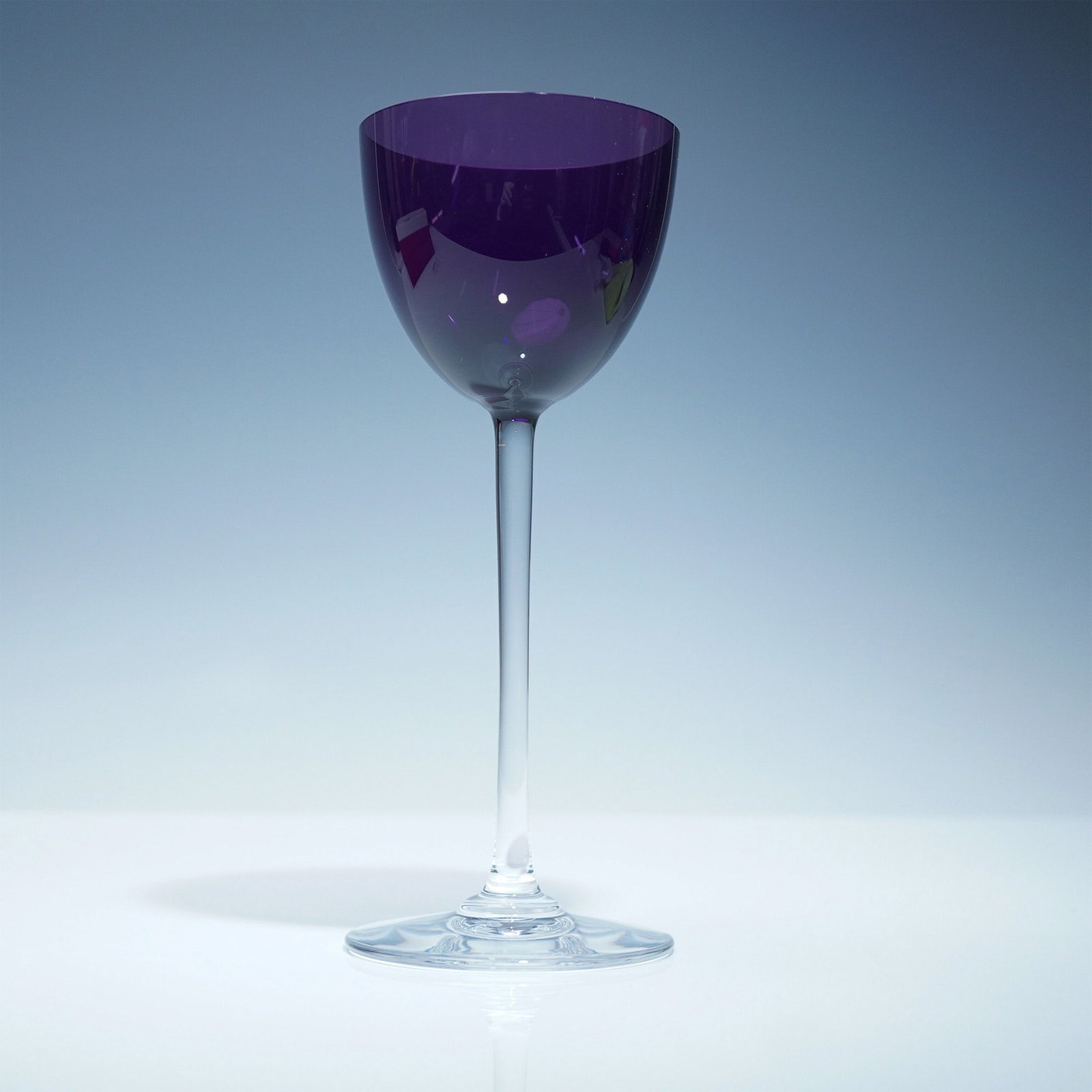 Baccarat Crystal Rhine Wine Glass, Amethyst Perfection, Boxed: A strikingly modern interpretation of classic luxury, this Baccarat Rhine wine glass from the Perfection collection features a rich amethyst-colored bowl atop a sleek, clear crystal stem. Crafted by t