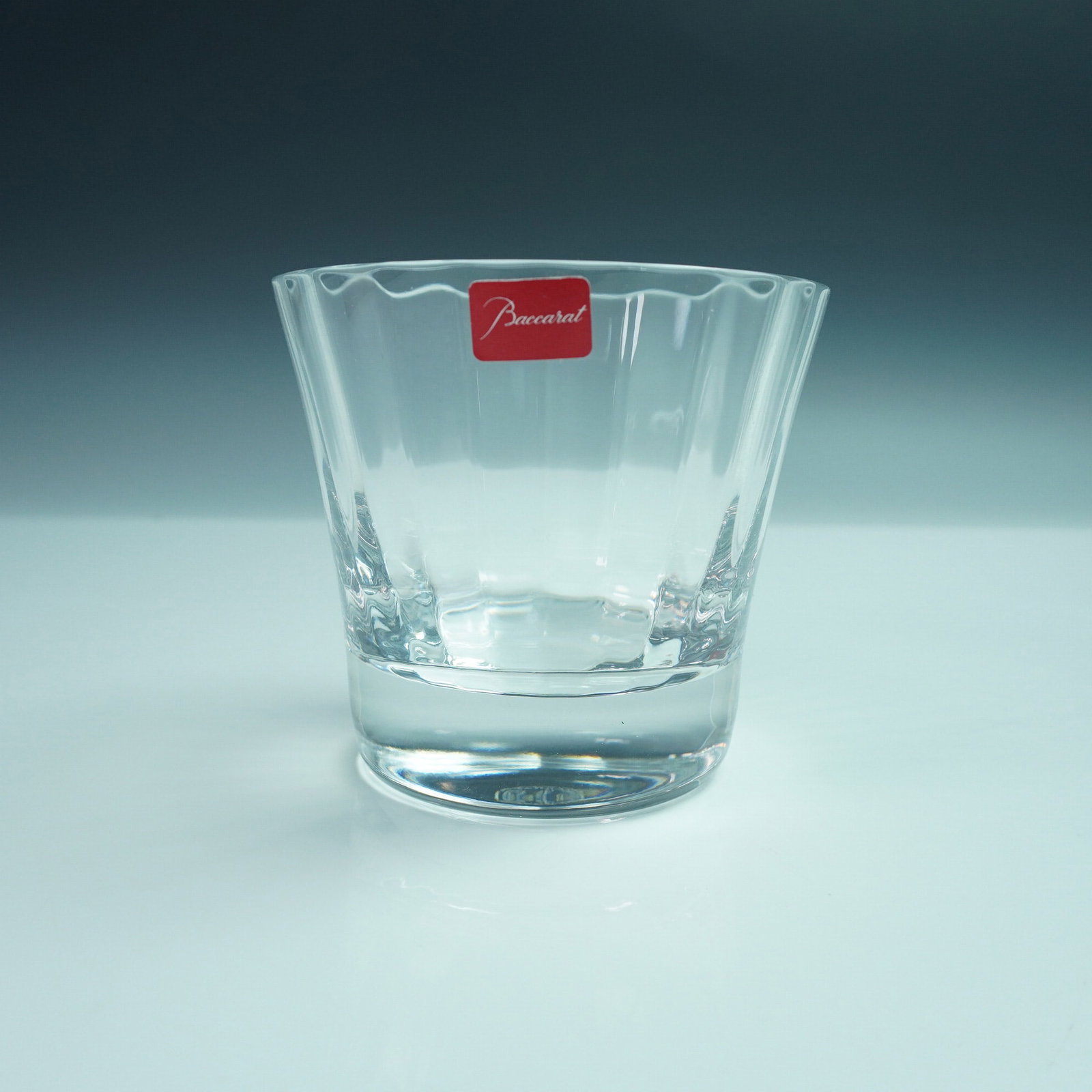 Baccarat Crystal Double Old Fashioned, Mille Nuits, Boxed: This exquisite Double Old Fashioned glass from the Mille Nuits collection by Baccarat blends dramatic style with refined craftsmanship. Designed by Mathias, it features signature vertical beveled cuts