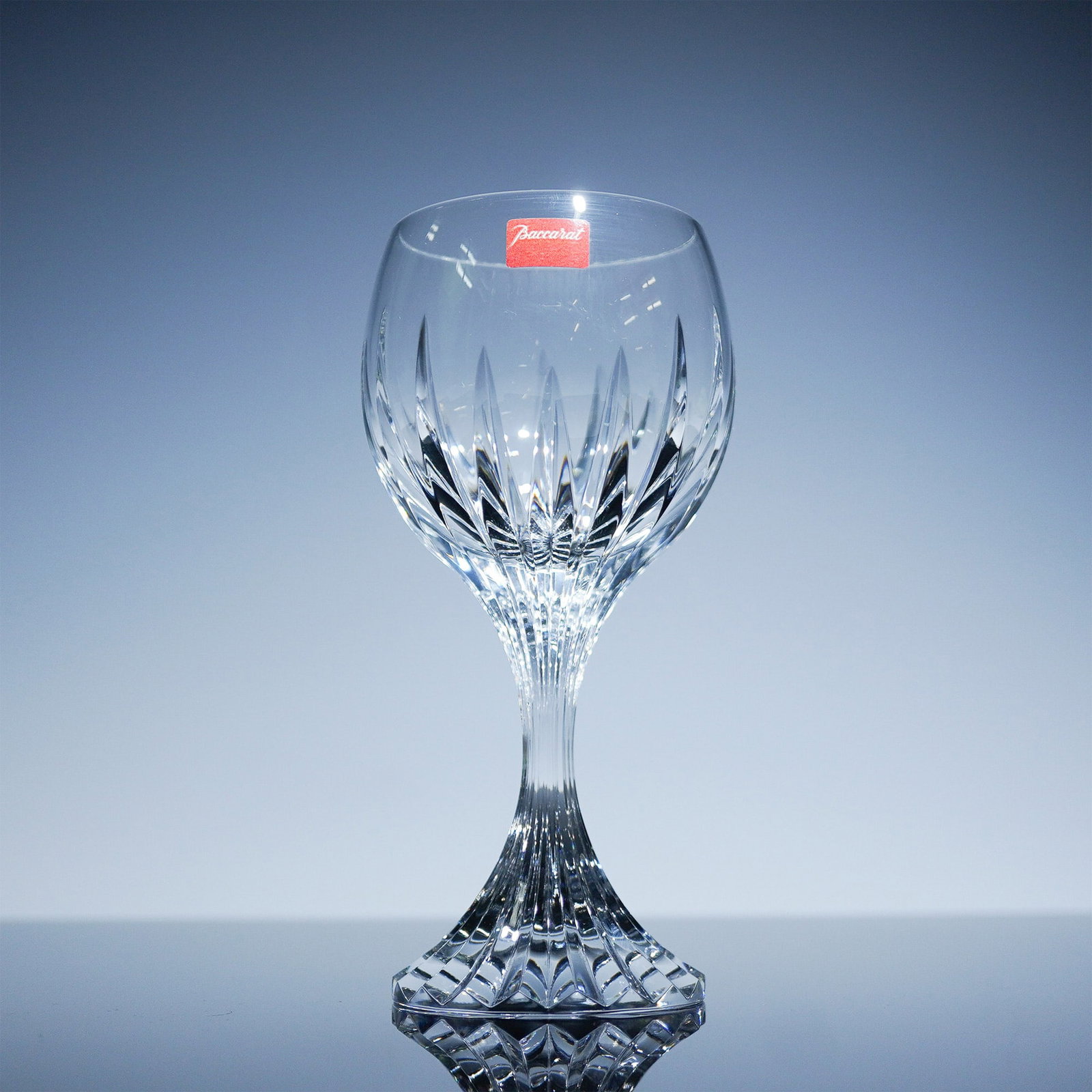 Baccarat Crystal White Wine Glass, Massena Pattern, Boxed: Elegant Baccarat crystal white wine glass in the iconic Massena pattern, featuring deep bevel cuts radiating from the base to the bowl for a dramatic display of light. This piece includes its original