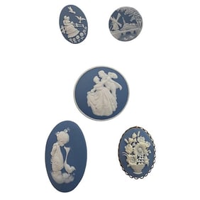 A small card of division three studio artist buttons