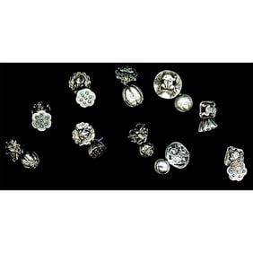 A small card of division one silver toggle buttons