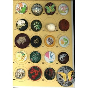 A card of division three assorted fabric buttons
