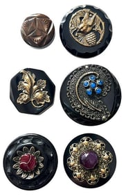 A small card of division three Bakelite Buttons
