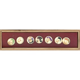 A boxed set of division three Asian themed buttons