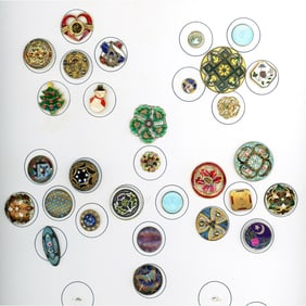 A partial card of division 1 & 3 assorted enamel buttons