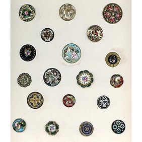 A small card of division one assorted enamel buttons