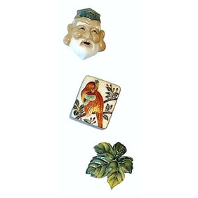 A small card of Japanese Arita porcelain buttons