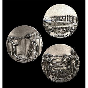 A small card of division three pictorial pewter buttons