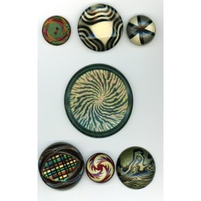A small card of division 1 & 3 celluloid buttons