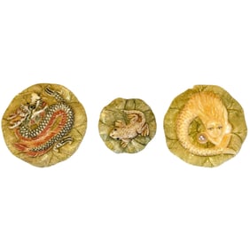 A small card of carved bone division three buttons