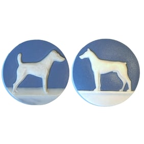 A small card of division three Studio artist buttons