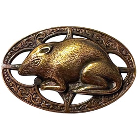A division one openwork pictorial animal button