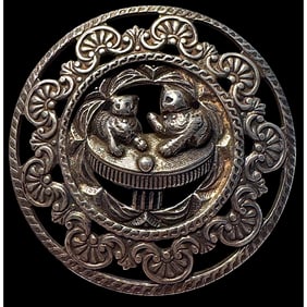 A division one pierced openwork animal button