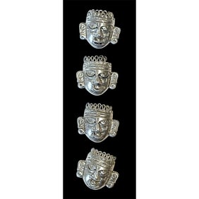 A small card of division three Mexican silver buttons