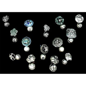 A small card of division one silver toggle buttons