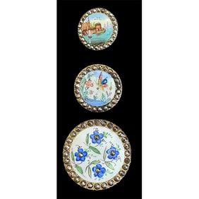 A small card of division one pictorial enamel buttons