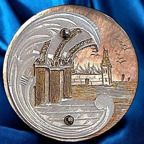 A division one engraved and united shell button