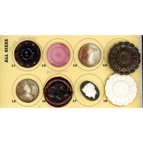 A small card of division 1 & 3 assorted glass buttons