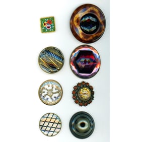 A small card of division 1 & 3 glass in metal buttons