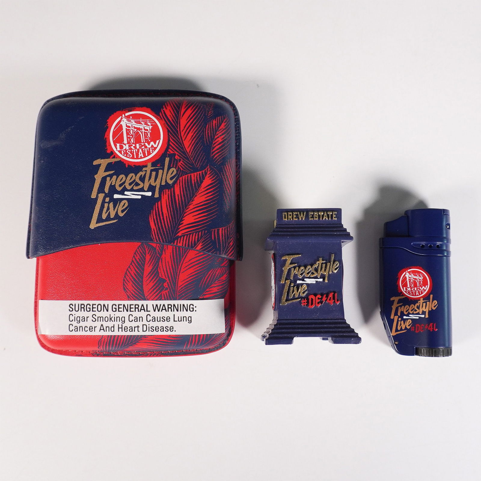 Drew Estate Freestyle Live Limited Edition Cigar Set: A limited edition Drew Estate Freestyle Live cigar set, featuring premium accessories and cigars from one of the most renowned names in the industry. The set includes a branded cigar case, a torch lig