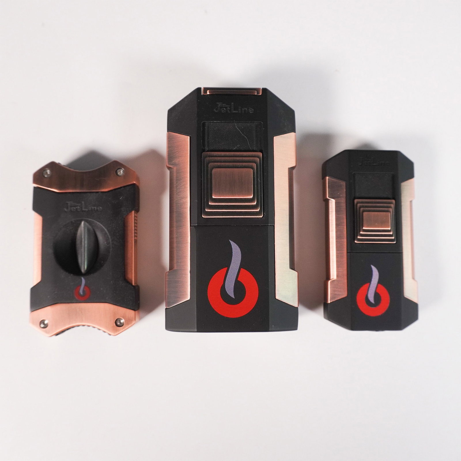 JetLine Cigar Accessory Set Model 49-480: A stylish and functional JetLine cigar accessory set featuring a trio of premium tools essential for any cigar aficionado. The set includes a dual-blade guillotine cutter, a compact single-torch light