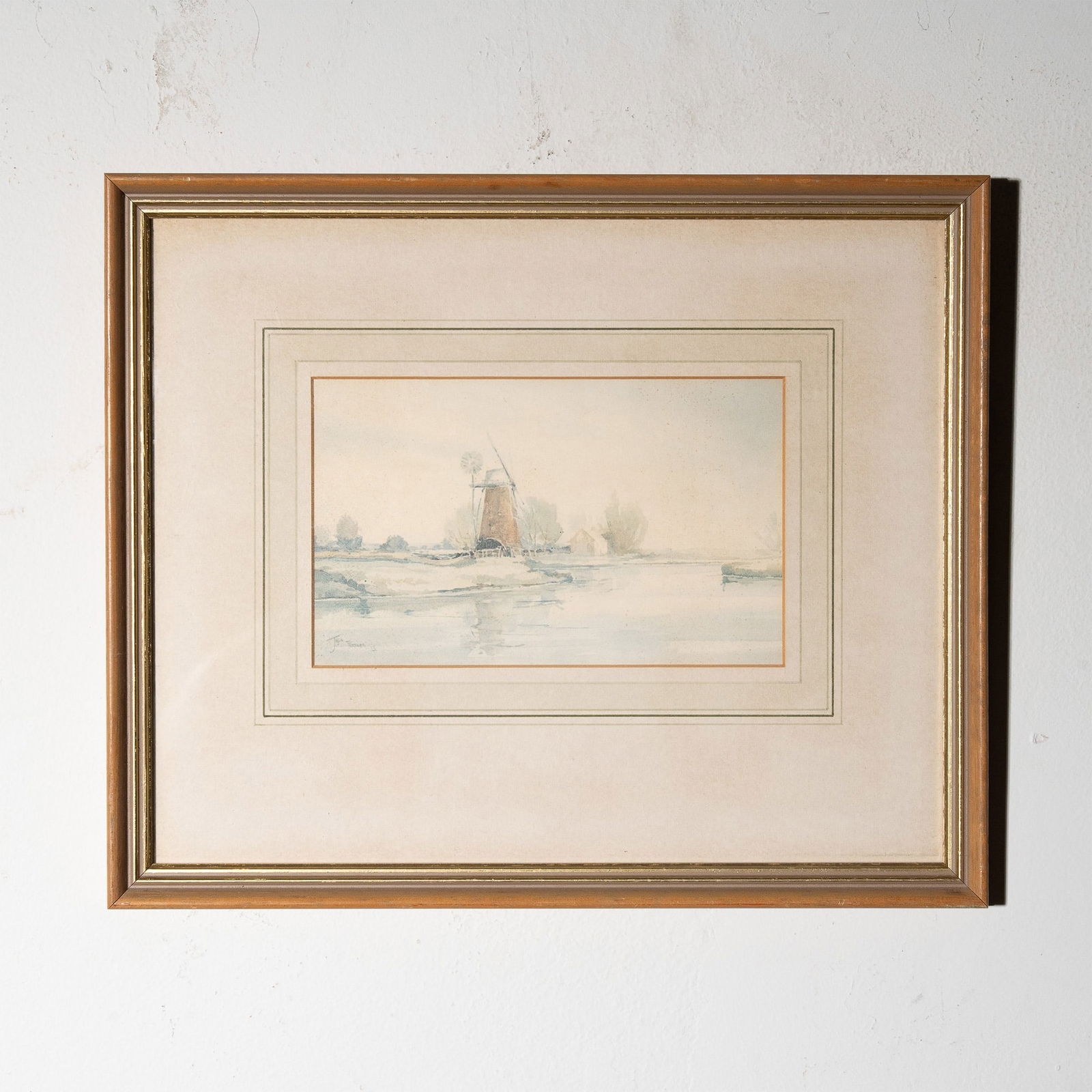 Jason Partner Watercolor Reproduction, Mill on the Ant Norfolk: This framed print, titled Mill on the Ant Norfolk, is a reproduction of an original watercolor by Jason Partner, L.S.A. The artwork captures a peaceful riverside scene featuring a traditional windmill
