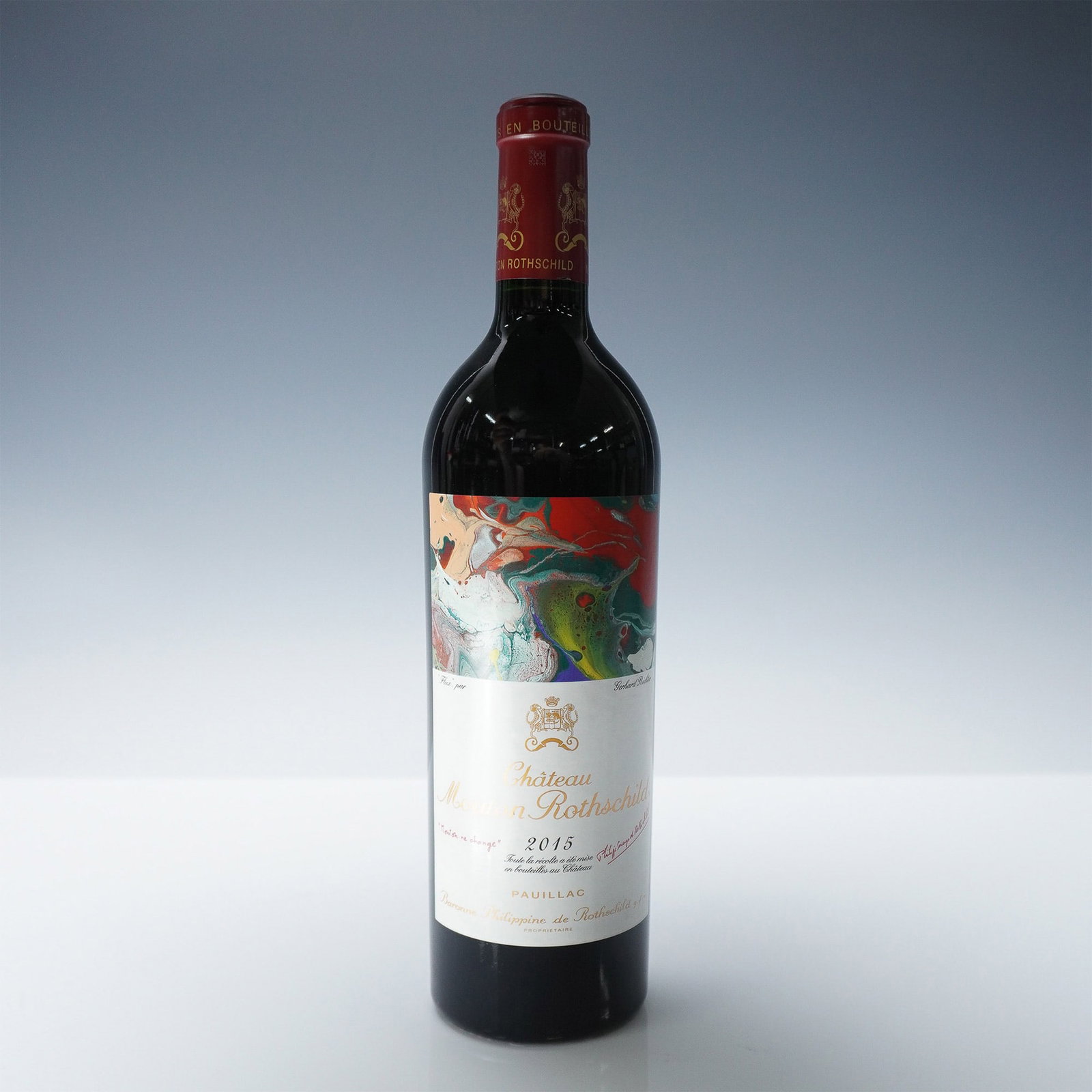2015 Chateau Mouton Rothschild Pauillac Grand Cru Classe - 750ml, 13.5% ABV: A 2015 vintage Chateau Mouton Rothschild, a prestigious Premier Grand Cru Classe Bordeaux from the Pauillac appellation. This exceptional vintage showcases a powerful and refined blend of Cabernet Sau
