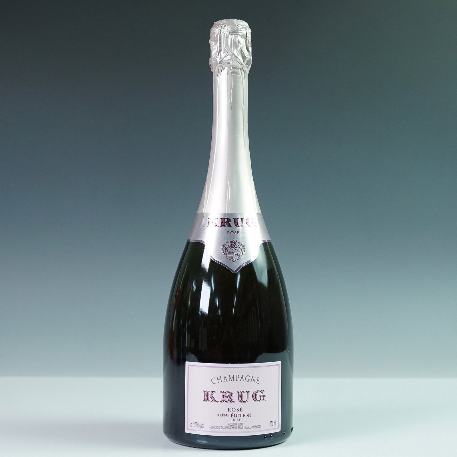 Krug Rose 25eme Edition Brut Champagne: This bottle of Krug Rose 25eme Edition Brut Champagne 750ml exemplifies the esteemed craftsmanship of Maison Krug, a prestigious Champagne house founded in 1843. Composed from a meticulous blend of re