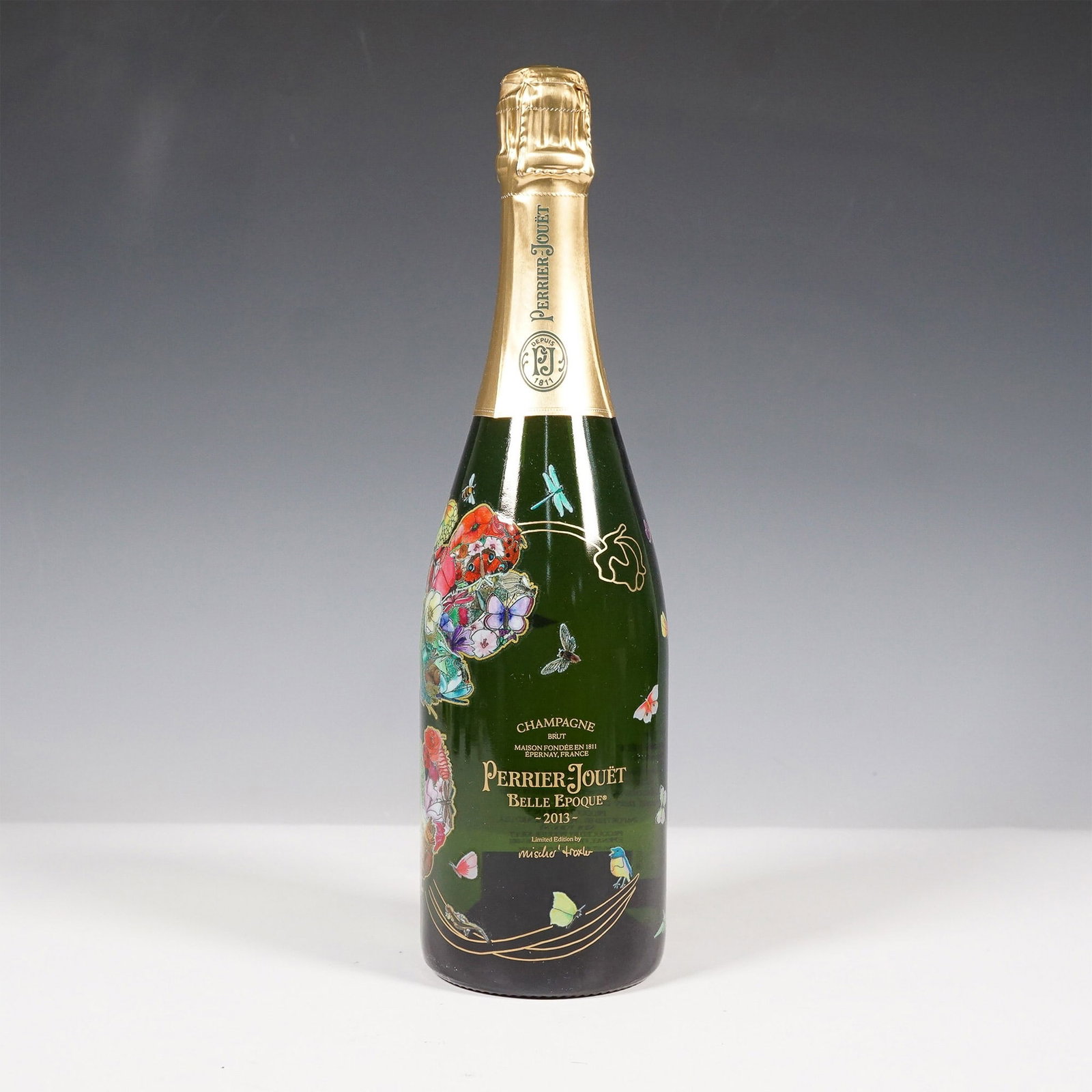 Perrier Jouet Belle Epoque 2013 Limited Edition Champagne Bottle: Perrier Jouet Belle Epoque 2013 Champagne Brut, a limited edition release, is presented in an intricately designed bottle featuring a nature inspired motif by artist Mischer Traxler. This exquisite ch