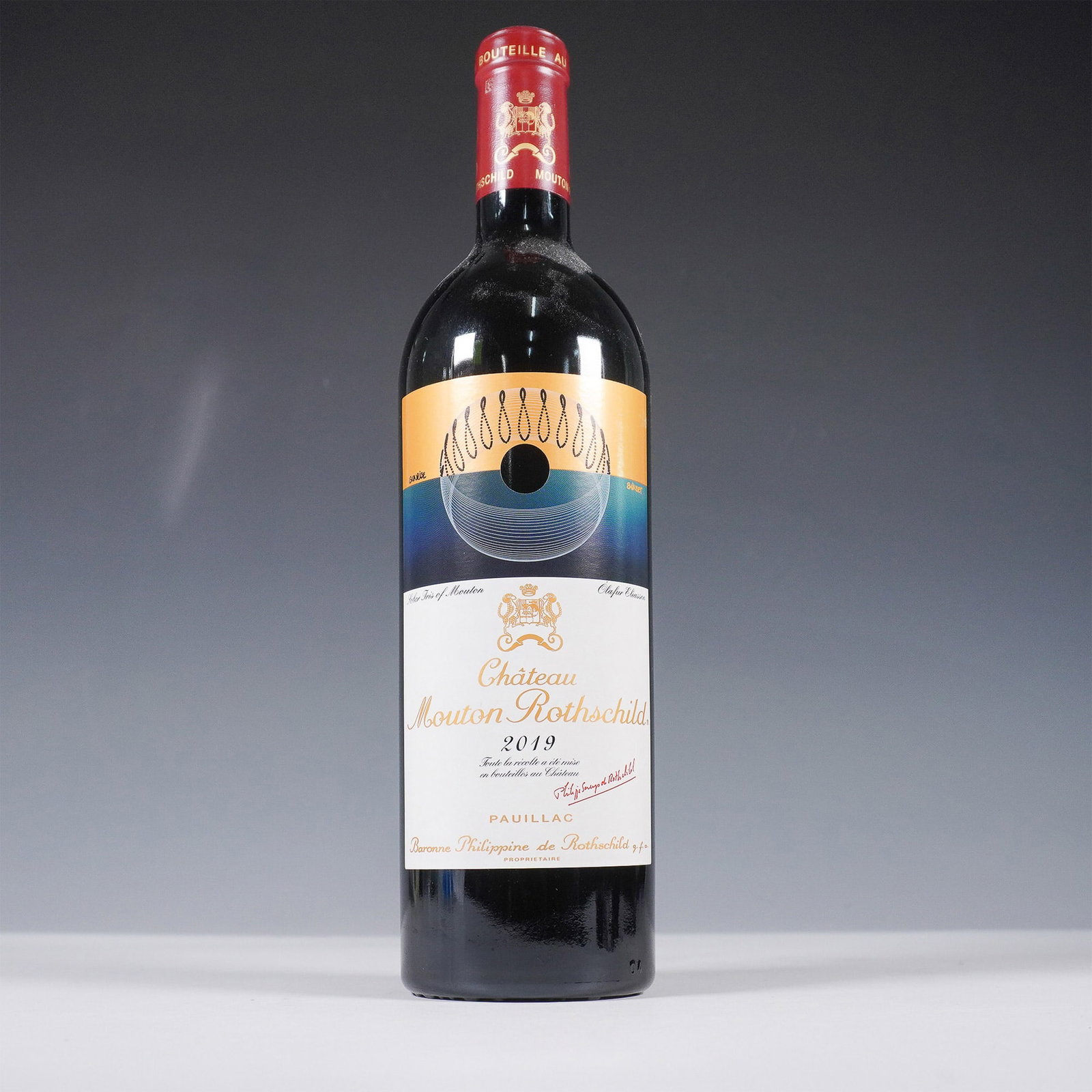 2019 Chateau Mouton Rothschild Pauillac First Growth: A 2019 Chateau Mouton Rothschild, a prestigious First Growth Bordeaux from the renowned Pauillac appellation. This legendary estate, owned by the Rothschild family since 1853, produces some of the mos