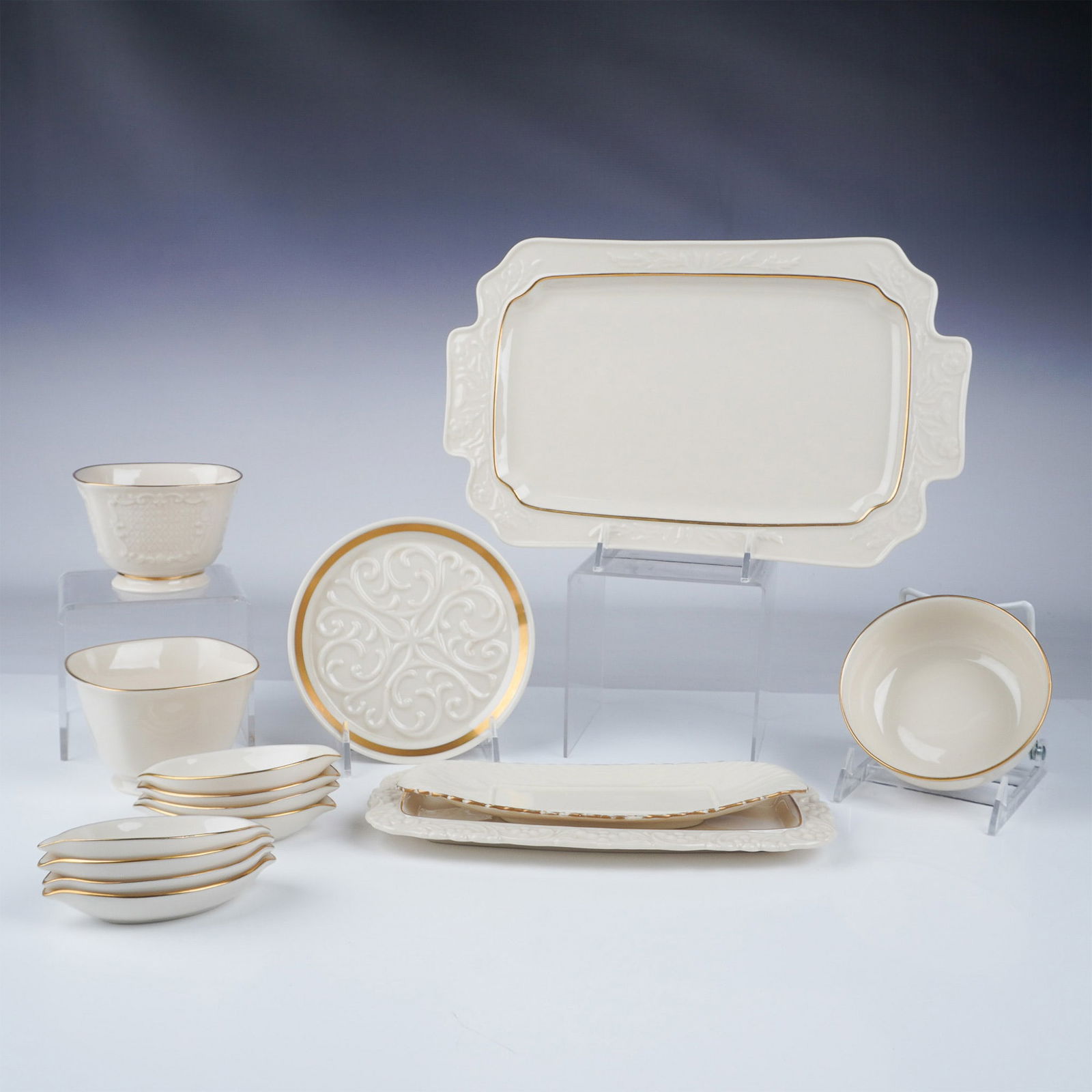 15pc Lenox Porcelain Tableware, Bowls to Tray: Elegant 15-piece Lenox porcelain tableware featuring a sophisticated ivory design accented with gilt trim. This collection includes a variety of serving and tableware pieces, perfect for formal dining