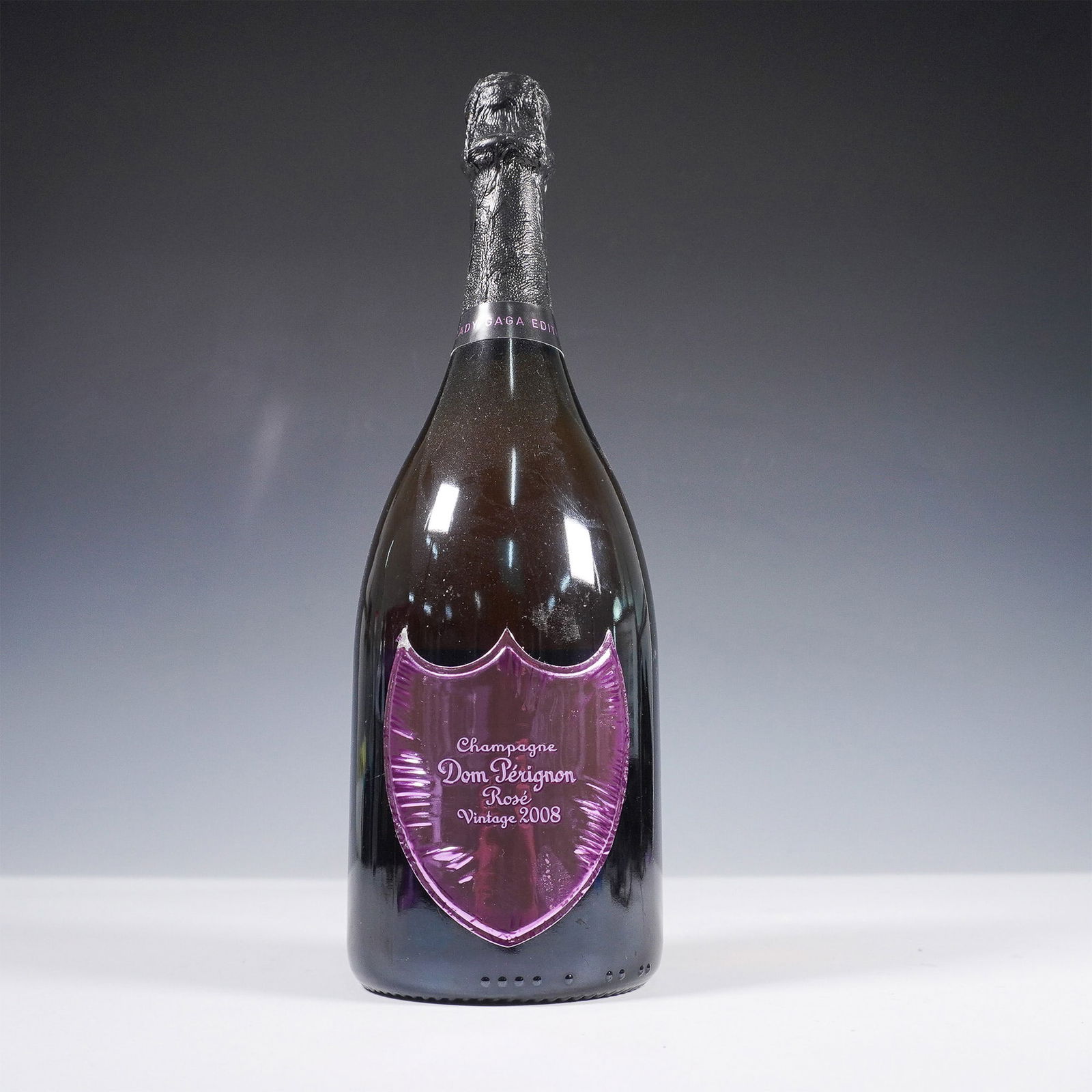 Dom Perignon Rose Vintage 2008 Lady Gaga Limited Edition With Box: This Dom Perignon Rose Vintage 2008 Lady Gaga Limited Edition features a striking metallic pink design reflecting the collaboration's avant-garde spirit. A masterful blend of Pinot Noir and Chardonnay