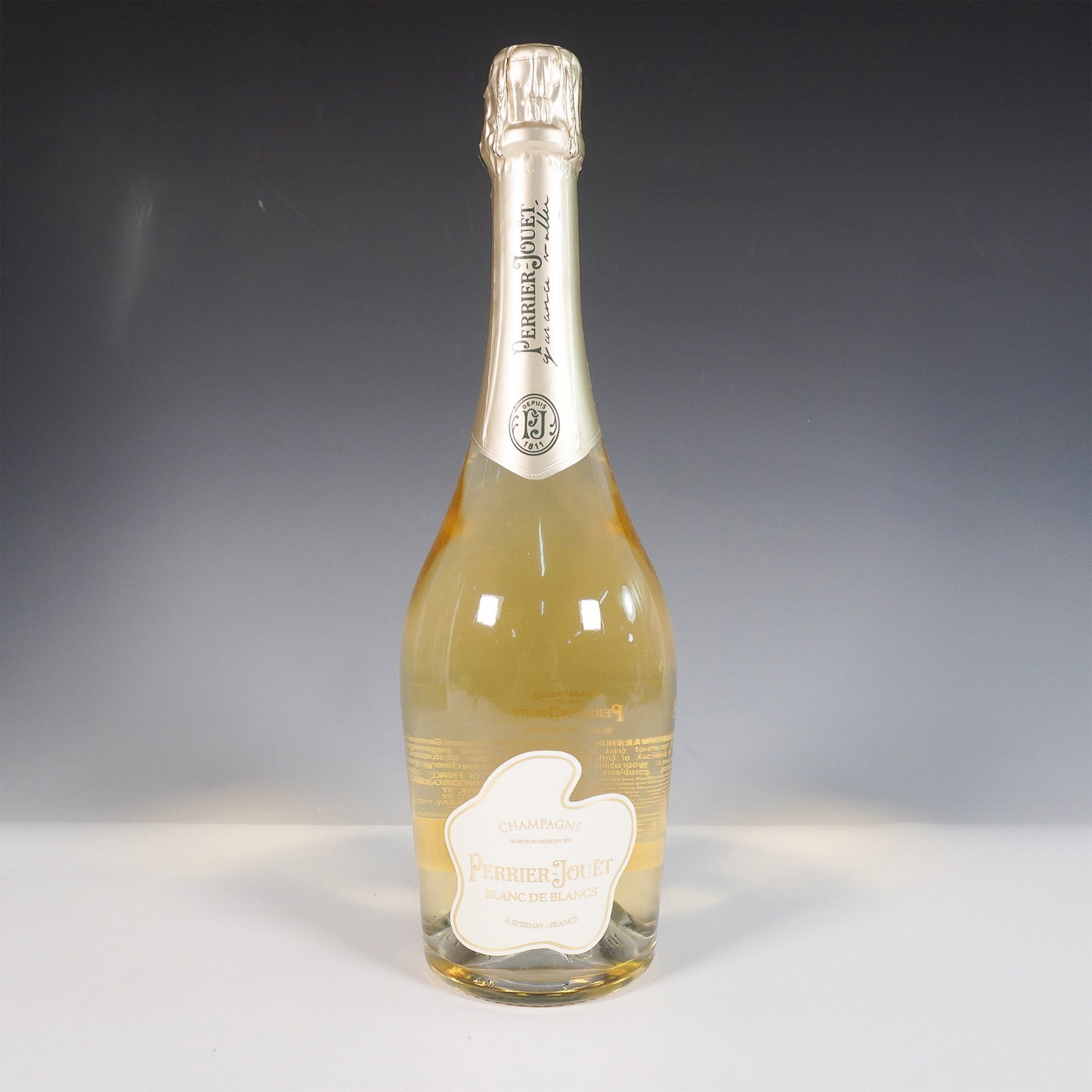 Perrier-Jouet Blanc de Blancs Champagne, Garance Vallee Edition: A special edition Perrier-Jouet Blanc de Blancs Champagne, featuring a stunning gift box designed by French artist Garance Vallee. This exclusive release reflects Vallee's signature organic and abstra