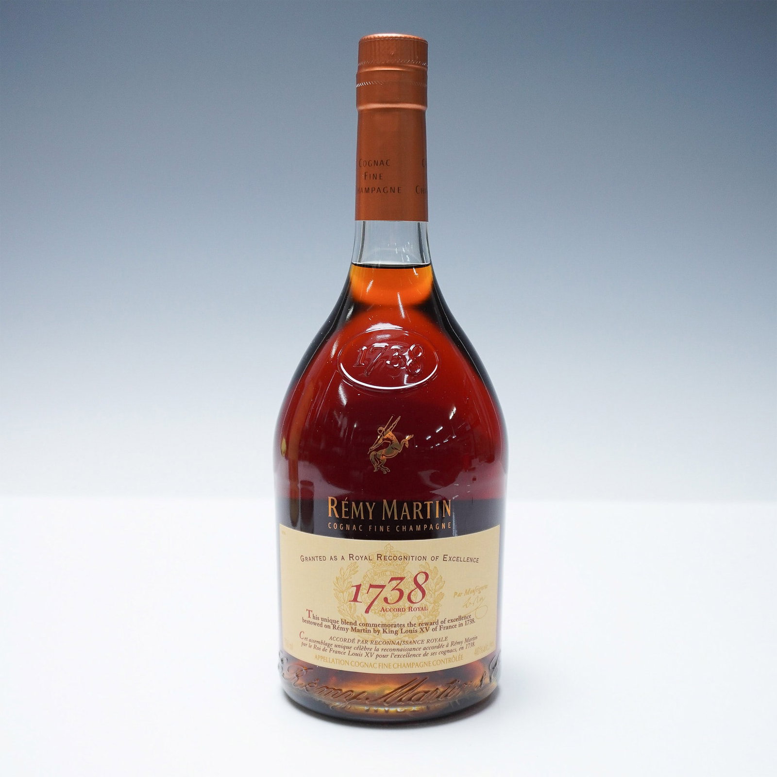 Remy Martin 1738 Accord Royal Fine Champagne Cognac: This bottle of Remy Martin 1738 Accord Royal Fine Champagne Cognac pays homage to the esteemed recognition granted by King Louis XV of France in 1738, celebrating the house's excellence in craftsmansh