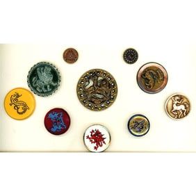 A small card of assorted material dragon buttons