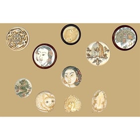 A small card of div. 3 carved natural material buttons