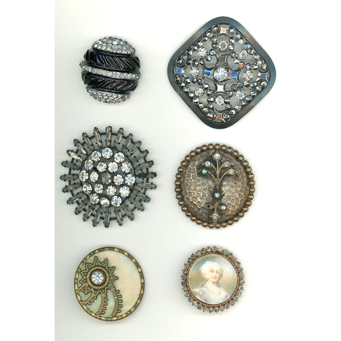 A small card of division one and three jeweled buttons (1 of 5)